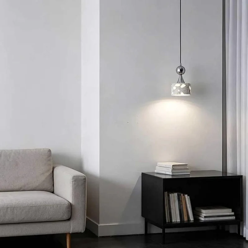 Small Terrazzo Pendant Light Featuring Four Point Seven Inch Polished Chrome Hanging Design to Elevate Your Living Space With Cool Vibes and Sophisticated Aesthetic for Cozy Reading Corners and Warm Downlight Ambiance in Modern Home Decor Settings.