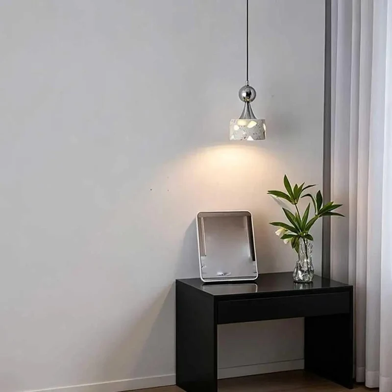 Small Terrazzo Pendant Light Featuring Four Point Seven Inch Polished Chrome Hanging Design to Elevate Your Living Space With Cool Vibes and Sophisticated Aesthetic for Cozy Reading Corners and Warm Downlight Ambiance in Modern Home Decor Settings.
