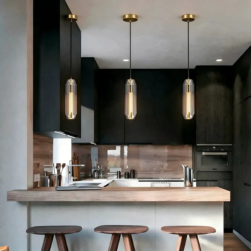 No Fuss Modern Pendant Light Featuring Easy Length Adjust And Hella Cool Smoke Gray Crystal Shade With Polished Brass Accents For Kitchen Islands Dining Rooms And Bar Counters