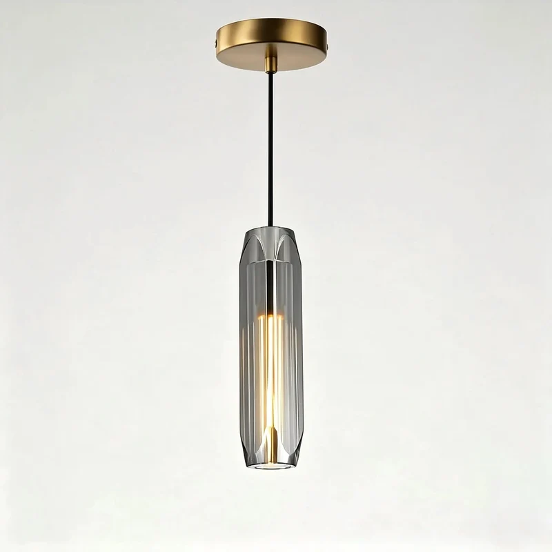 No Fuss Modern Pendant Light Featuring Easy Length Adjust And Hella Cool Smoke Gray Crystal Shade With Polished Brass Accents For Kitchen Islands Dining Rooms And Bar Counters