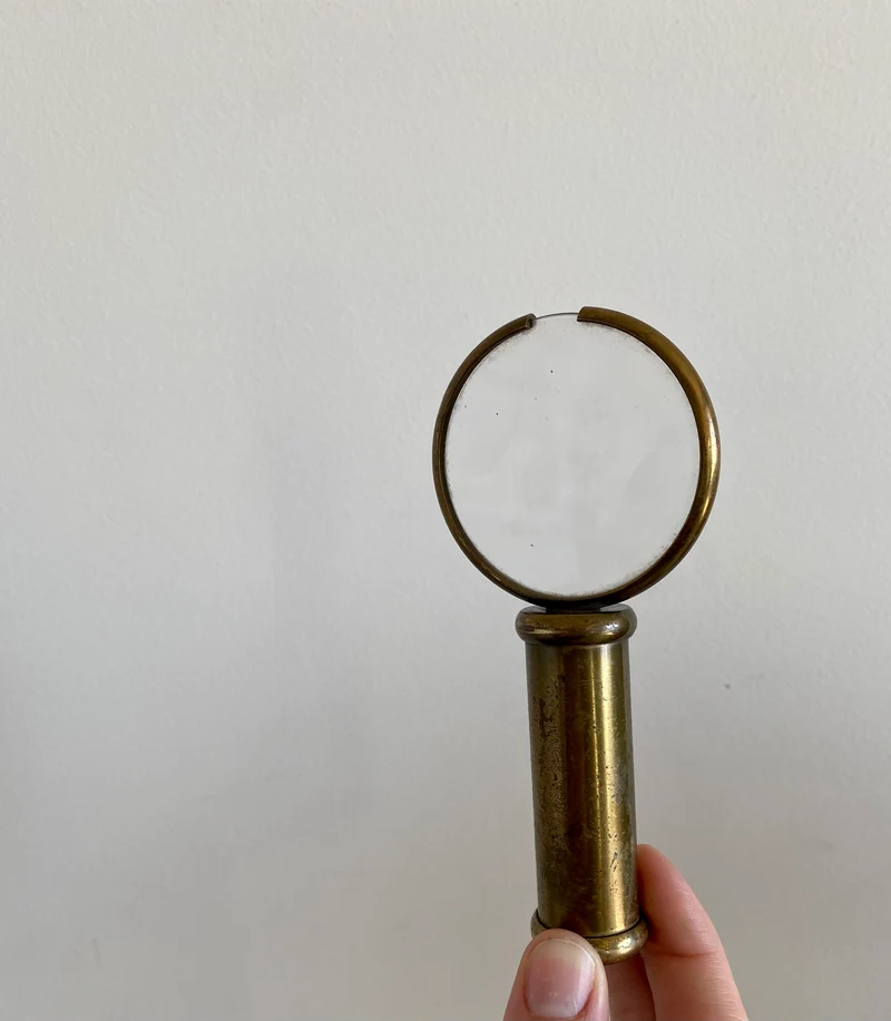 Loupe en laiton ancien