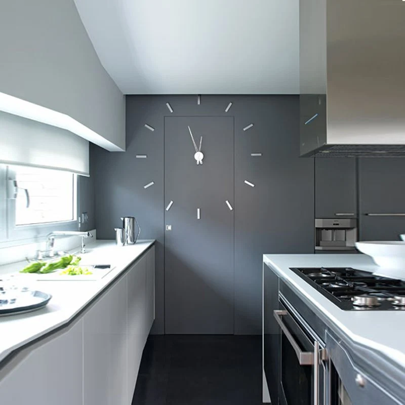 Nomon Tacón t Wall Clock